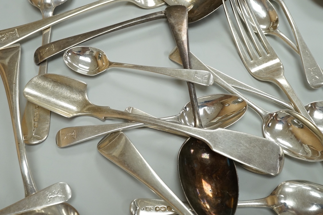 A small quantity of assorted 19th century silver flatware, various patterns, dates and makers, including a set of nine Old English pattern teaspoons, William Chawner II, London, 1833, an Old English pattern basting spoon